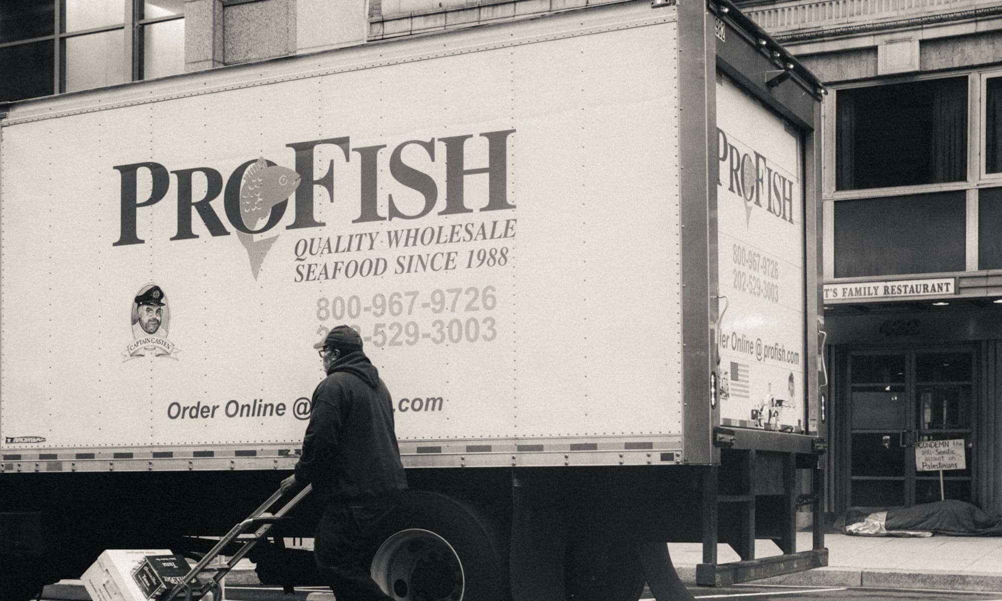 ProFish retail pickup truck at the curb — direct-from-the-fleet seafood