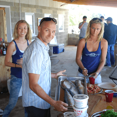 Chefs touring a working crab-picking facility on the Chesapeake